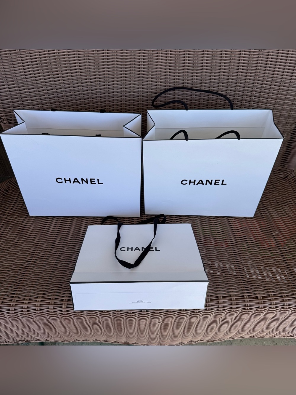 Three Chanel Shopping Bags, Two Large one Medium